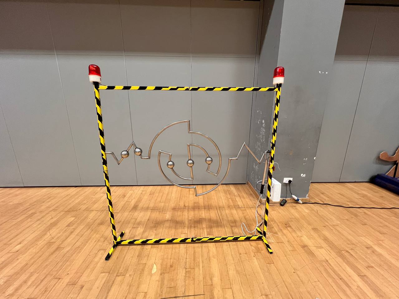 Close-up of the Buzz Wire game at SUTD Indoor Sports, Singapore neatly arranged and ready for participants.