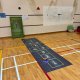 Traditional hopscotch game setup at Gongshang Primary School, Singapore, with colorful numbered boxes on the ground.