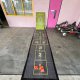 Traditional hopscotch mat placed on the floor at Teck Whye Ave, Singapore, ready for players to jump through.