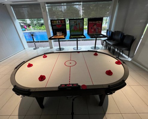 Multiplayer Air Hockey - The Lakefront Residences Multiplayer Air Hockey game setup at The Lake Front Residences, Singapore, allowing 4–6 players to compete simultaneously in a fast-paced match.