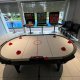 Multiplayer Air Hockey - The Lakefront Residences Multiplayer Air Hockey game setup at The Lake Front Residences, Singapore, allowing 4–6 players to compete simultaneously in a fast-paced match.