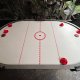 Multiplayer Air Hockey - The Winery at Chijmes Arcade-style multiplayer Air Hockey at The Winery at Chijmes, Singapore, designed for 4 to 6 players to play together.