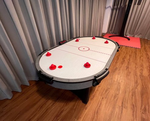 Multiplayer Air Hockey - Tiong Bahru CC Exciting Multiplayer Air Hockey station at Tiong Bahru, Singapore, designed for up to 6 players — perfect for engaging event entertainment.