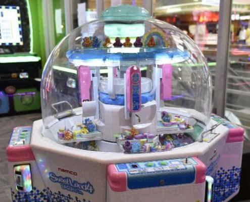 candy pusher arcade machine, prize pusher, coin pusher