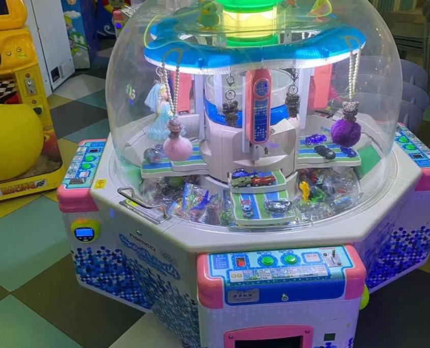 candy pusher arcade machine, prize pusher, coin pusher
