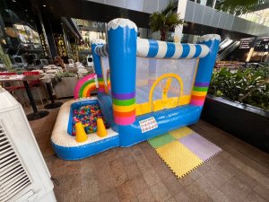 rainbow house, rainbow bouncy castle