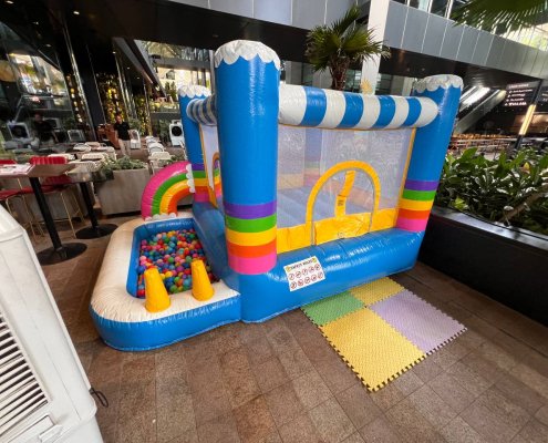 rainbow house, rainbow bouncy castle