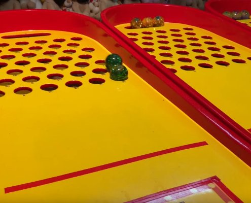 Roll a ball carnival game