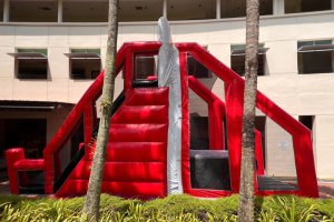 The Inflatable Free Fall platform with a cushioned landing area.