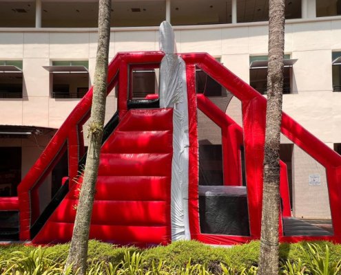 The Inflatable Free Fall platform with a cushioned landing area.