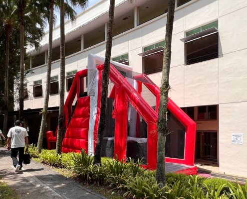 The Inflatable Free Fall platform with a cushioned landing area.