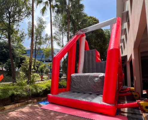 The Inflatable Free Fall platform with a cushioned landing area.