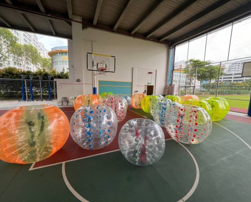 Players enjoying an exciting game of bubble soccer at Northbrook Secondary School, Singapore