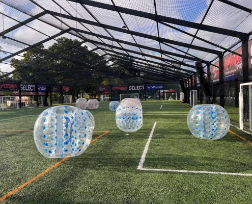 Colorful bubble soccer equipment set up at The Cage, Singapore