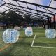 Colorful bubble soccer equipment set up at The Cage, Singapore