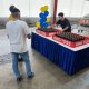 Neatly arranged bottle ring toss game, ready for players at Singapore.