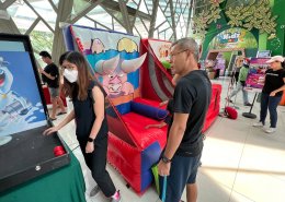 Inflatable Bull Ring Toss game at SAFRA, Singapore, where players aim to land rings on bull horns.