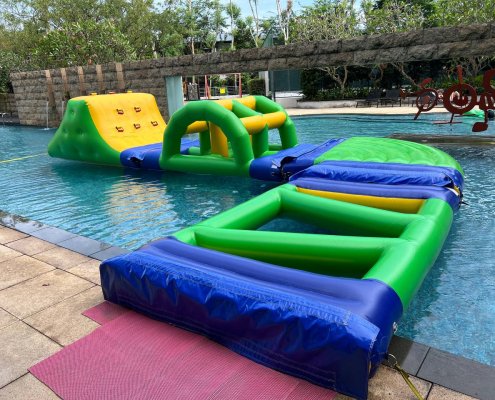 Colorful Connector section with flat surface and bold edges, part of a modular inflatable water course.