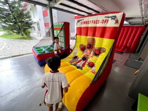 Cowboy Face-Off inflatable game setup at Woodlands Street, Singapore, featuring a western-themed challenge for players.