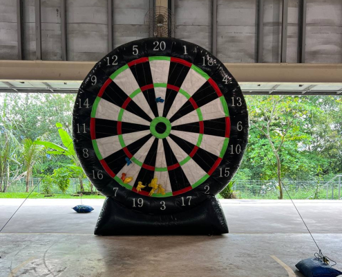Giant Dart inflatable game at Penjuru Recreation Centre in Singapore, featuring a large dartboard and colorful suction-tip darts.