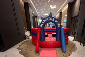 Gladiator Dome inflatable at Novotel Singapore, ready for players to stand on the platforms and play.