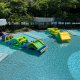 The Hill as part of a floating water obstacle course, combining a climb-and-slide challenge for all ages.