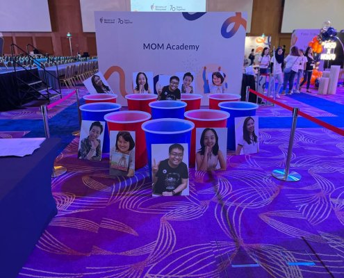 Customizable human size beer pong game ready for play in a spacious indoor area at Resort World Sentosa, Singapore.
