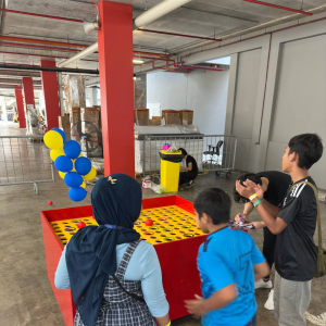 Players toss giant wiffle balls at custom targets in this exciting accuracy game, located at Green Forest Park, Singapore.