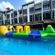 Single Leap inflatable obstacle with a narrowing pathway and a small green triangular bump with a yellow tip in the center.