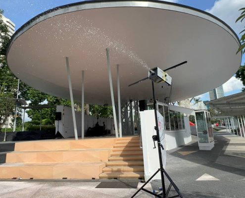 Snow machine in use at Science Centre Singapore Main Entrance, creating artificial snowfall for an event