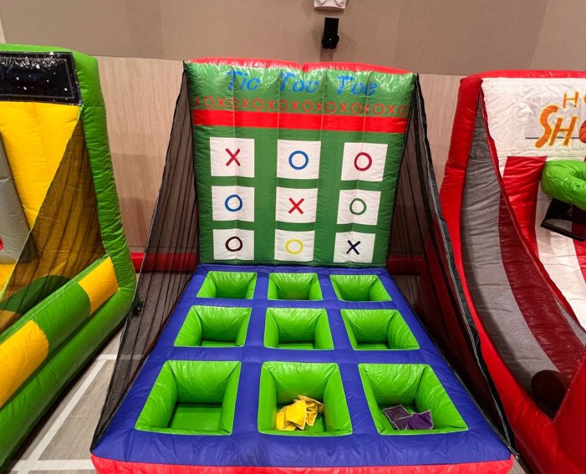 Colorful inflatable Tic Tac Toe game setup at Sengkang Grand Mall, Singapore.
