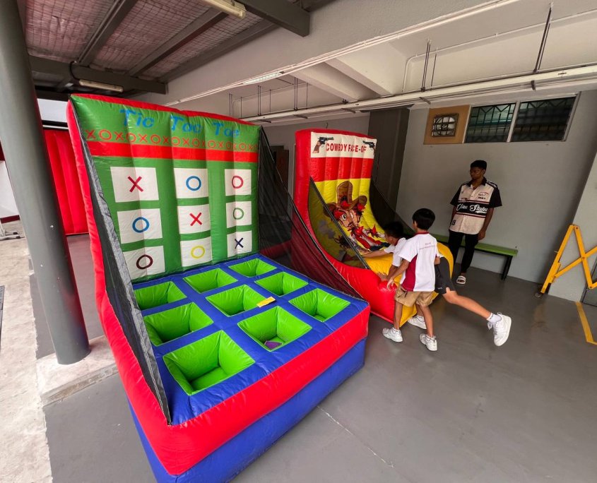 Vibrant inflatable Tic Tac Toe game at Woodlands Street, Singapore, designed for interactive play.
