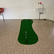 A close-up of the Big Foot Golf Putting Mat at Lakepoint Condo, Singapore, showing its lifelike turf surface designed to help improve putting accuracy.