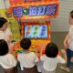 Students playing Bishi Bashi arcade game at Henry Park Primary School, Singapore – exciting mini-games and friendly competition