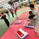 Interactive Giant Country Eraser game in Singapore featuring oversized erasers and a soft floor mat.