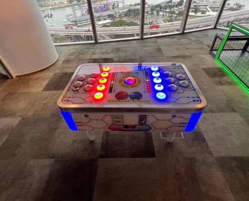 Play the addictive Naughty Beans game at Centennial Tower, Singapore and challenge your friend to a speed test.