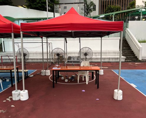 Standing fan setup at Upper Bukit Timah Road, Singapore, to provide cooling at an outdoor event.