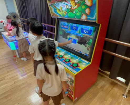 Whack'em Funny Gators - Henry Park Primary School 2 Whack'em Funky Gators arcade game at Henry Park Primary School, Singapore – fun and fast-paced gator-whacking action for kids
