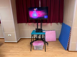 A Nintendo Wii setup featuring a TV screen, Wii console, and motion controllers placed on a table, prepared for interactive gameplay at Bedok South Secondary School, Singapore.