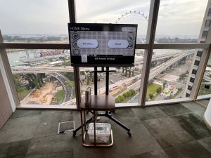 Wii gaming station setup at Centennial Tower, Singapore – interactive motion-based games for fun and active event entertainment