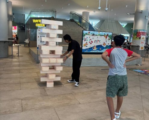 Giant Jenga tower set up at Gongshang Primary School, Singapore, standing tall on the ground and ready for play.