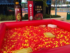 Themed corporate event zone with ball pit activity for employees in Singapore