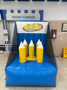 Toddlers playing in On Point soft inflatable play zone at indoor event