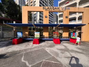 Light carnival game stations at Ramadan event in Singapore with family-friendly setup