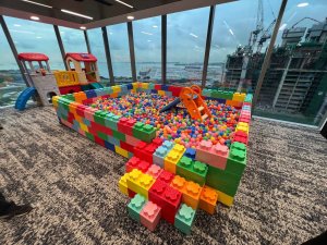 Colourful lego themed ball pit play area for kids party