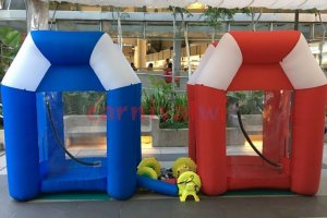Inflatable money blowing machine at a Chinese New Year 2026 event in Singapore, popular for corporate and community celebrations