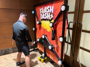 Flash Dash interactive reaction game at an event in Singapore, fast-paced light-up challenge for kids and adults