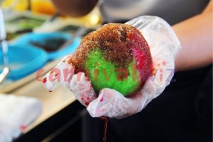Traditional ice ball dessert from halal-friendly carnival stall