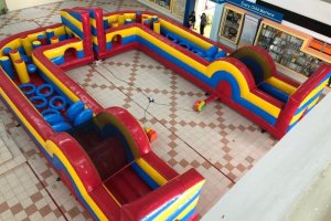Convertible inflatable obstacle challenge used for large scale corporate family day events in Singapore